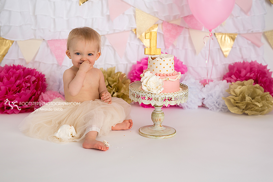 vacaville smash cake photographer pink gold cake