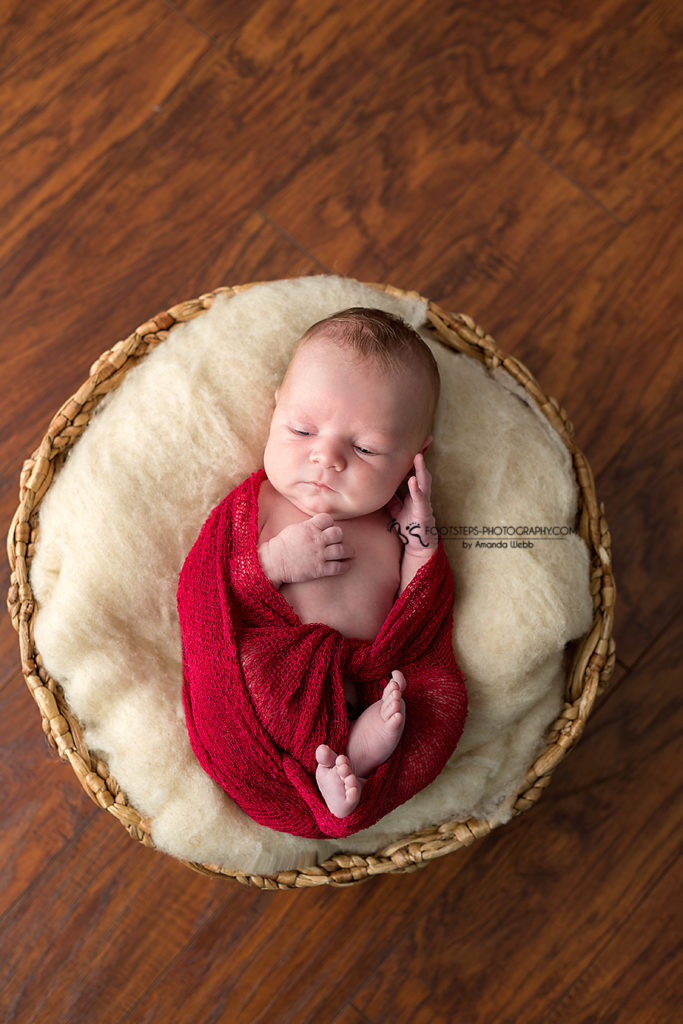 red wrap christmas newborn