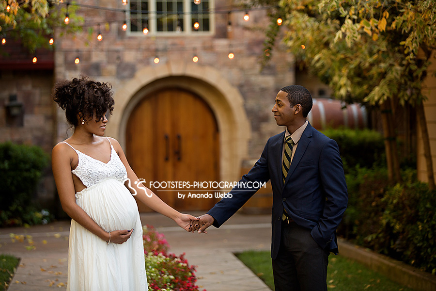 in love maternity couple vineyard